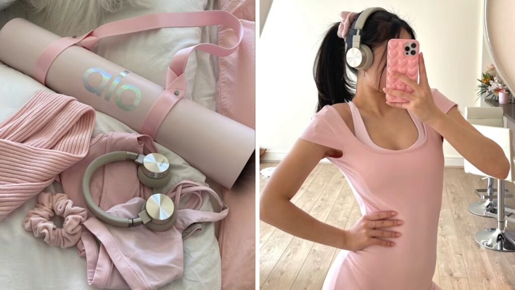 Pink Pilates accessories and a woman in a matching pink outfit take a mirror selfie.